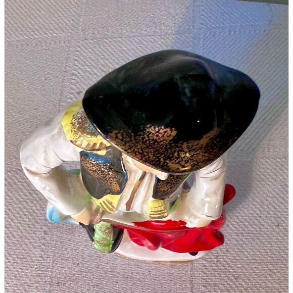 Vibrant Mid Century Bullfighter Figurine
Matador Statue With Sword & Red
Cape - Picture 12 of 12